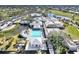 Community pool and clubhouse aerial view at 335 Pembroke S Ln # 229, Venice, FL 34293
