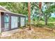 Backyard oasis with lush landscaping and water view at 335 Pembroke S Ln # 229, Venice, FL 34293