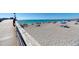 Beautiful beach with clear water and people enjoying the sun at 335 Pembroke S Ln # 229, Venice, FL 34293