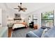 Bedroom with queen bed and plenty of natural light at 335 Pembroke S Ln # 229, Venice, FL 34293