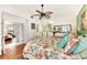 Spacious bedroom with king-size bed and access to another room at 335 Pembroke S Ln # 229, Venice, FL 34293