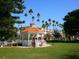 White gazebo in a grassy park setting in Venice at 335 Pembroke S Ln # 229, Venice, FL 34293