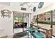 Eat-in kitchen with view to a cozy and relaxing Florida room at 335 Pembroke S Ln # 229, Venice, FL 34293