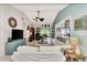 Spacious living room with white sofas and view into kitchen at 335 Pembroke S Ln # 229, Venice, FL 34293