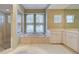 Bathroom with a large bathtub, double vanity, and shower at 339 Meadow Beauty Ct, Venice, FL 34293