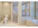 Bathroom featuring a shower, toilet and bathtub at 339 Meadow Beauty Ct, Venice, FL 34293