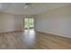 Spacious bedroom featuring laminate flooring and access to a patio at 339 Meadow Beauty Ct, Venice, FL 34293