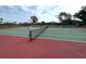 Well-maintained tennis court at 339 Meadow Beauty Ct, Venice, FL 34293