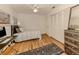 Cozy bedroom with light wood floors and built-in closet at 341 Pembroke Ln # 227, Venice, FL 34293