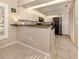 Modern kitchen with stainless steel appliances at 341 Pembroke Ln # 227, Venice, FL 34293