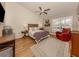 Spacious main bedroom with wood floors and sitting area at 341 Pembroke Ln # 227, Venice, FL 34293
