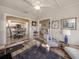 Sunroom with views into kitchen and living room at 341 Pembroke Ln # 227, Venice, FL 34293