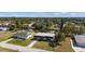 Aerial view of the property with a beautiful waterfront, showcasing the surrounding neighborhood at 3560 Middletown St, Port Charlotte, FL 33952