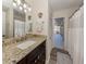 Bathroom with granite countertop and walk-in shower at 4060 Barbary Ln, North Port, FL 34287