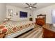 Cozy bedroom with antique furniture and ceiling fan at 4060 Barbary Ln, North Port, FL 34287