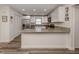 Updated kitchen, featuring granite countertops and stainless steel appliances at 4060 Barbary Ln, North Port, FL 34287