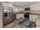 Well-equipped kitchen with stainless steel appliances and granite countertops at 4060 Barbary Ln, North Port, FL 34287