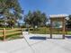 Park entrance with trail map and wooden fence at 4060 Barbary Ln, North Port, FL 34287