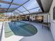 Enjoy this large, screened pool and patio area at 4060 Barbary Ln, North Port, FL 34287
