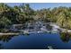 Dark, still water with lush vegetation at 4060 Barbary Ln, North Port, FL 34287
