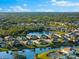 Aerial view of single-Gathering home with a screened in lanai at 4264 Wordsworth Way, Venice, FL 34293