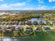 Aerial view of single-Gathering home with screened pool and lanai at 4264 Wordsworth Way, Venice, FL 34293