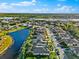 Aerial view of single-Gathering home with screened lanai at 4264 Wordsworth Way, Venice, FL 34293