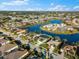 Aerial view of single-Gathering home with a large backyard at 4264 Wordsworth Way, Venice, FL 34293