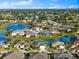Aerial view of single-Gathering home with pool and lanai at 4264 Wordsworth Way, Venice, FL 34293