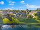 Aerial view of single-Gathering home with screened lanai and pool at 4264 Wordsworth Way, Venice, FL 34293
