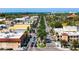 Aerial view of a town with palm trees and buildings at 4264 Wordsworth Way, Venice, FL 34293