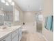 Bathroom features a bathtub and shower at 4264 Wordsworth Way, Venice, FL 34293