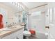 Clean bathroom with tub, shower, and updated vanity at 4264 Wordsworth Way, Venice, FL 34293