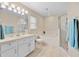 Clean bathroom with soaking tub and walk-in shower at 4264 Wordsworth Way, Venice, FL 34293