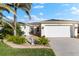 House exterior with garage and walkway at 4264 Wordsworth Way, Venice, FL 34293