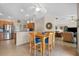 Kitchen with breakfast nook and view of living room at 4264 Wordsworth Way, Venice, FL 34293