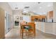 Bright kitchen with stainless steel appliances and breakfast bar at 4264 Wordsworth Way, Venice, FL 34293