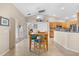 Bright kitchen with stainless steel appliances and breakfast bar at 4264 Wordsworth Way, Venice, FL 34293