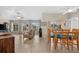 Living room with comfortable seating and pool view at 4264 Wordsworth Way, Venice, FL 34293