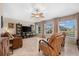 Living room with comfortable seating and pool view at 4264 Wordsworth Way, Venice, FL 34293