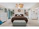 Spacious main bedroom with ensuite bathroom access at 4264 Wordsworth Way, Venice, FL 34293