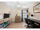 Home office with a desk, chair, and window view at 4264 Wordsworth Way, Venice, FL 34293