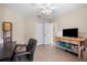Home office with desk, chair, and ample storage at 4264 Wordsworth Way, Venice, FL 34293