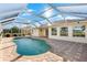 Large screened pool and patio with water view at 4264 Wordsworth Way, Venice, FL 34293