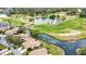 Aerial view of home near golf course and canals at 4619 Forest Wood Trl # 7, Sarasota, FL 34241