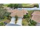 Aerial view of home near golf course and canals at 4619 Forest Wood Trl # 7, Sarasota, FL 34241
