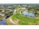 Wide aerial view of community and golf course at 4619 Forest Wood Trl # 7, Sarasota, FL 34241