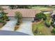 Two-car garage and nicely landscaped front yard at 4619 Forest Wood Trl # 7, Sarasota, FL 34241