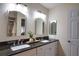 Double vanity bathroom with granite countertops at 4619 Forest Wood Trl # 7, Sarasota, FL 34241