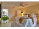 Spacious bedroom with king-size bed and ensuite bath at 4619 Forest Wood Trl # 7, Sarasota, FL 34241